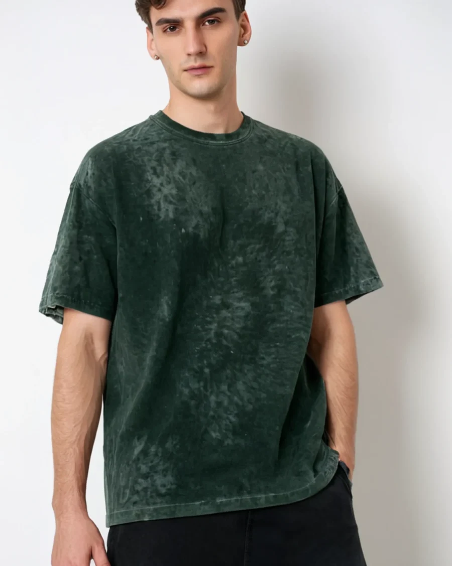 A men’s solid green acid wash oversized T-shirt with a vintage-inspired design, ideal for casual and streetwear fashion.